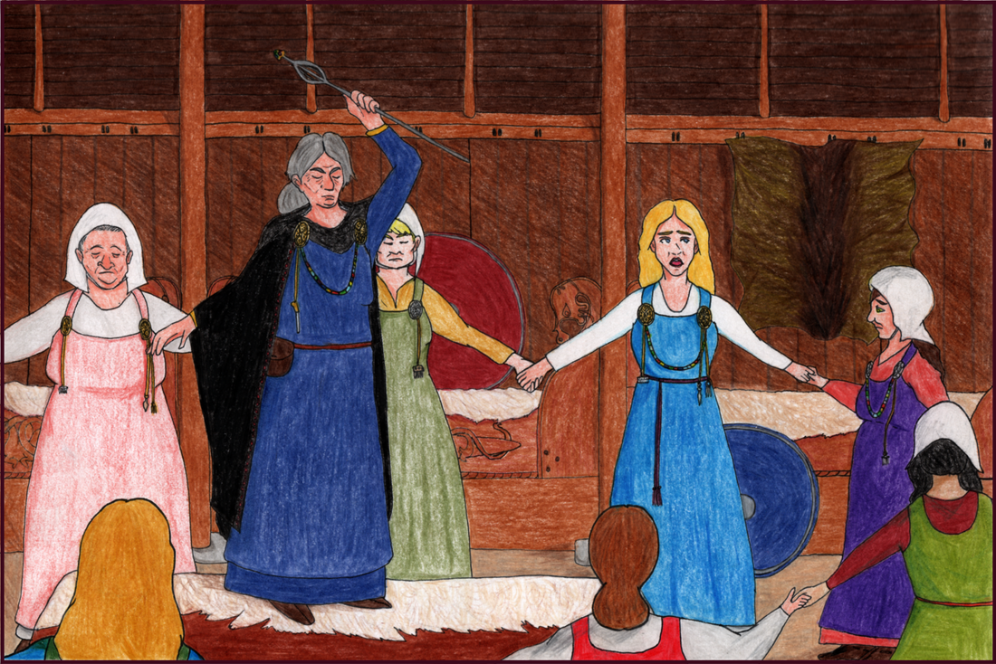 Picture. A circle of white women stand holding hands inside a wooden Viking house. They surround an old woman who is standing on a platform and raising a silver staff. She wears a dark blue dress and a black cloak, and her eyes are closed in concentration. One of the people in the circle is a young woman with blonde hair and a blue dress. Her mouth is open in song, but she looks conflicted about what she is doing.